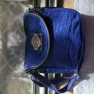 Genuine Fossil shoulder bag on Royal blue.